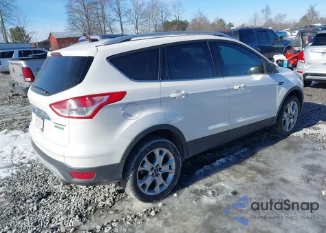 2014 Ford Escape Titanium z USA, uszkodzony, nr VIN 1FMCU0J99EUA91053